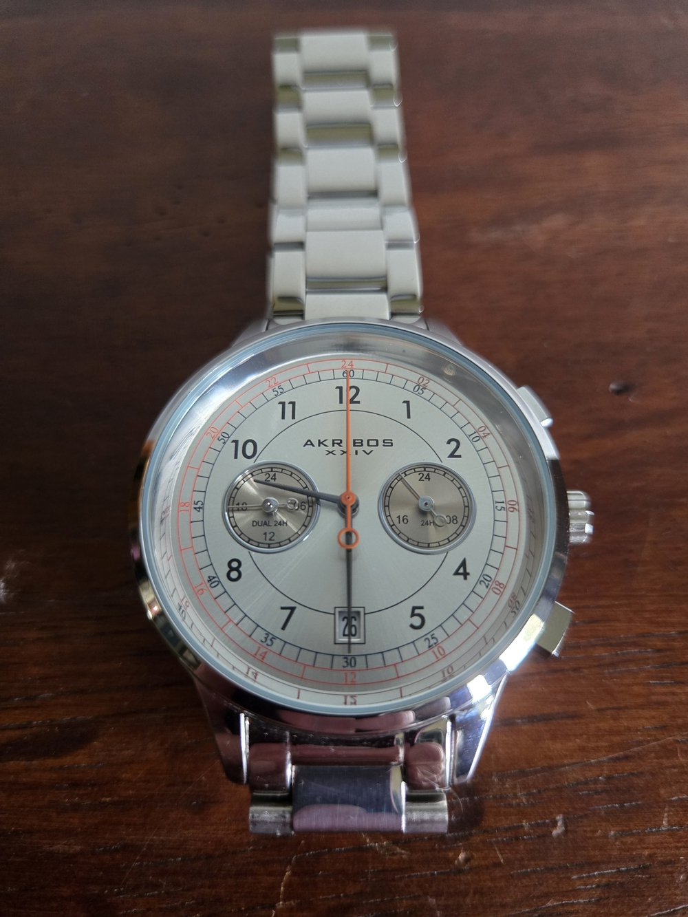 Akribos XXIV Men’s Silver Tone Dual Time Watch White Dial Orange Accent